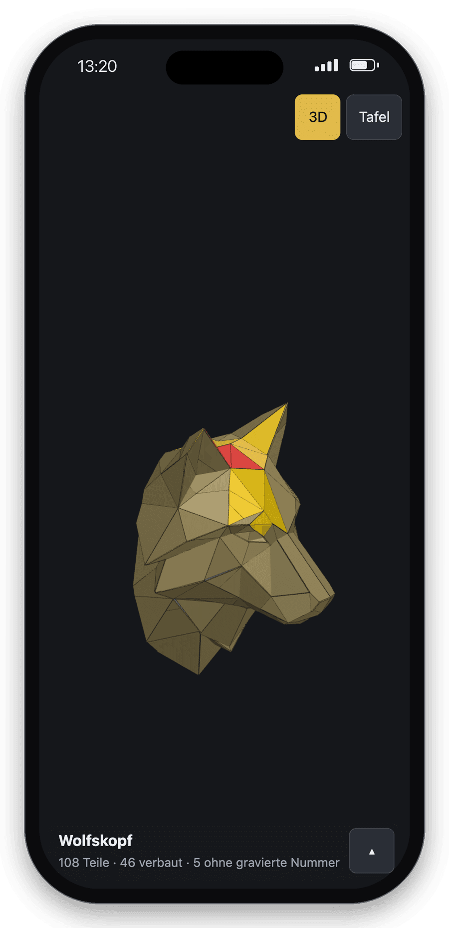 Handy mit der Montage-App: 3D-Modell eines Wolfskopfs, gewähltes Teil rot, Nachbarteile gelb