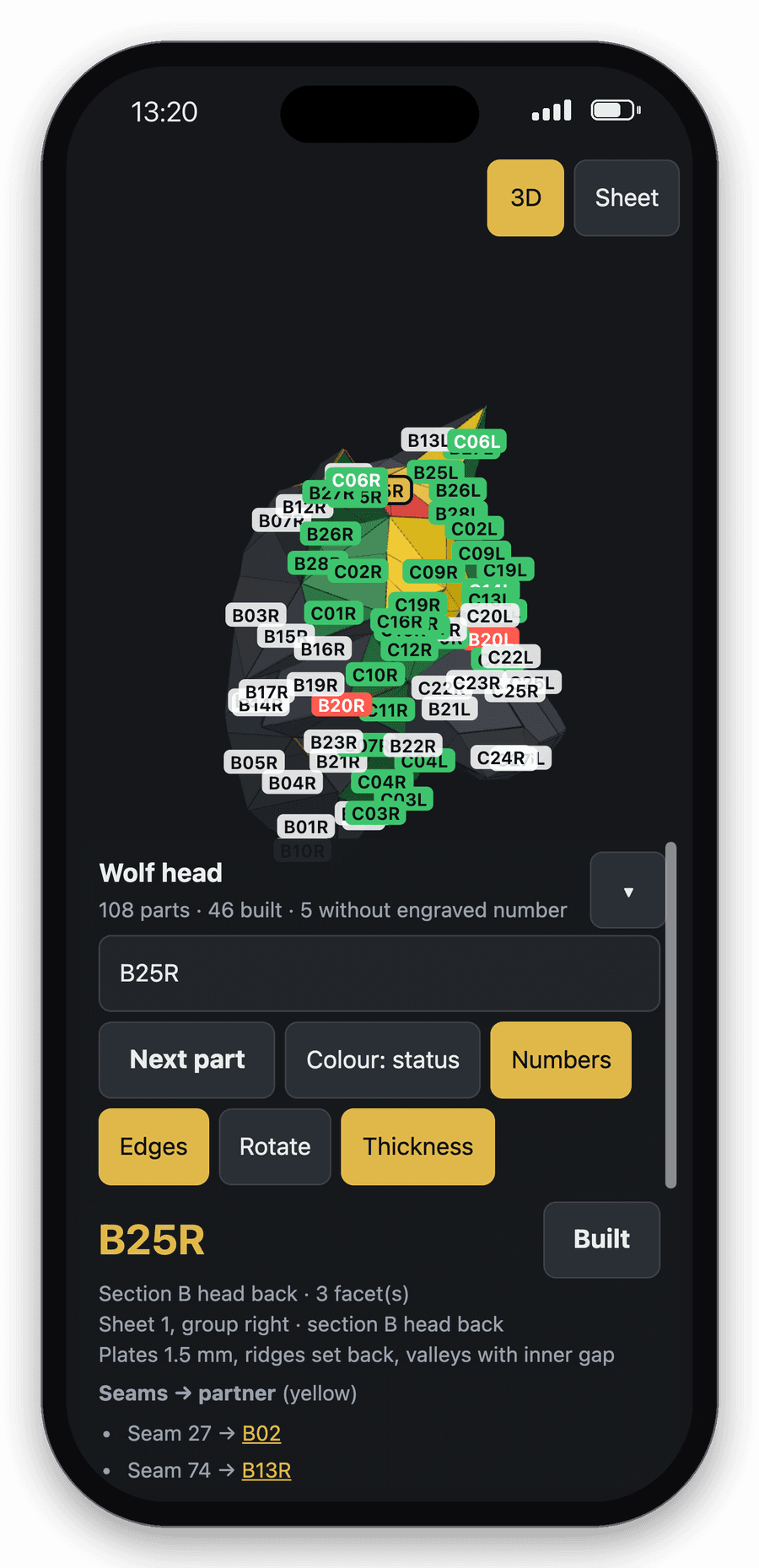 Phone with the assembly app: wolf head half built, finished parts green