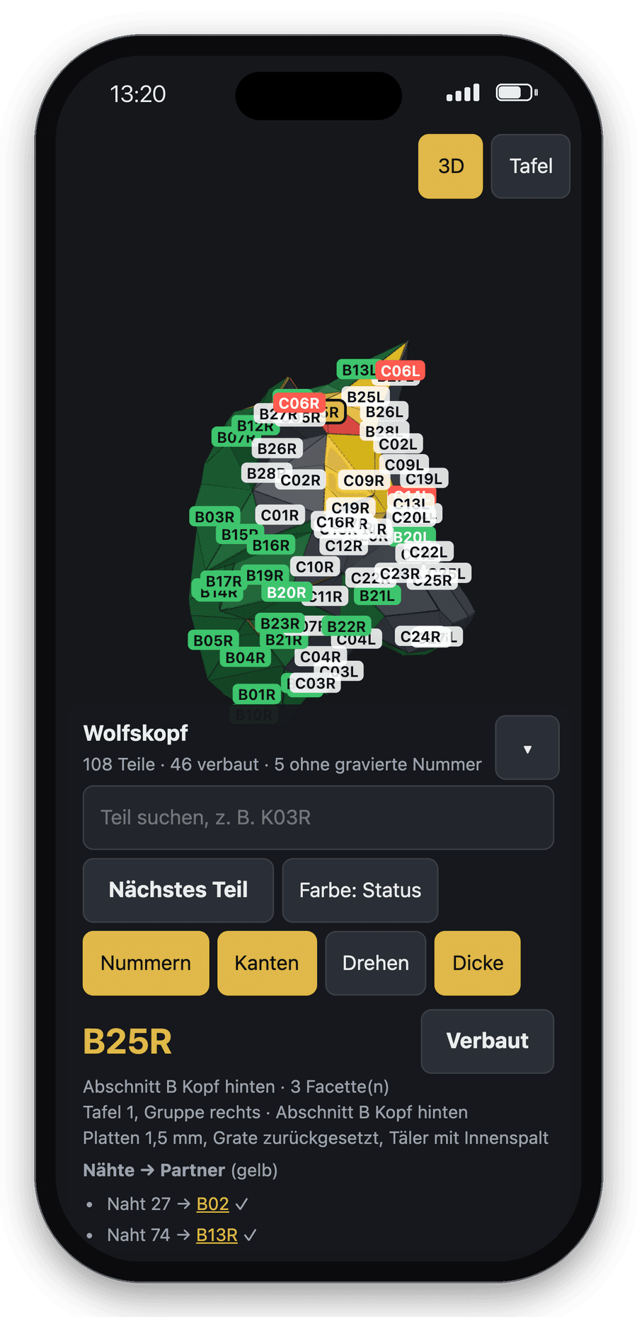 Handy mit der Montage-App: Wolfskopf zur Hälfte gebaut, verbaute Teile grün